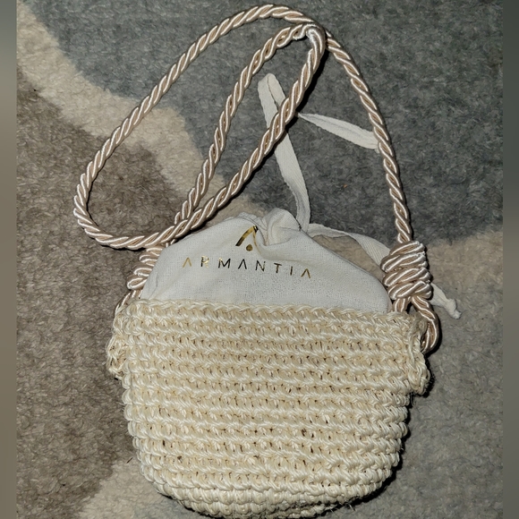 Anthropologie Handbags - Anthropologie Armantia Mini Drawstring Woven Shoulder Bag